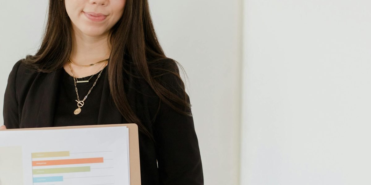 A person looking confidently at a laptop screen, ready to embark on a new business venture without technical stress.