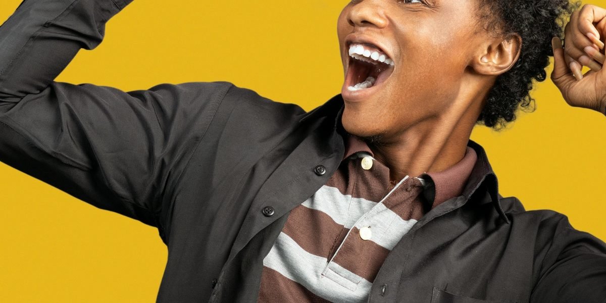 A person celebrating a business milestone, reflecting the achievement of turning YouTube engagement into affiliate income.
